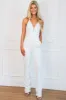 Start the Party Detachable Cape Sequin Jumpsuit: White sold by Bella and Bloom