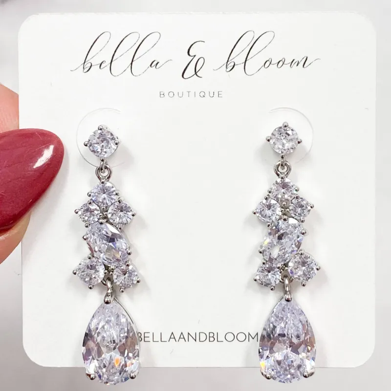 Take My Hand Earrings: Silver sold by Bella and Bloom
