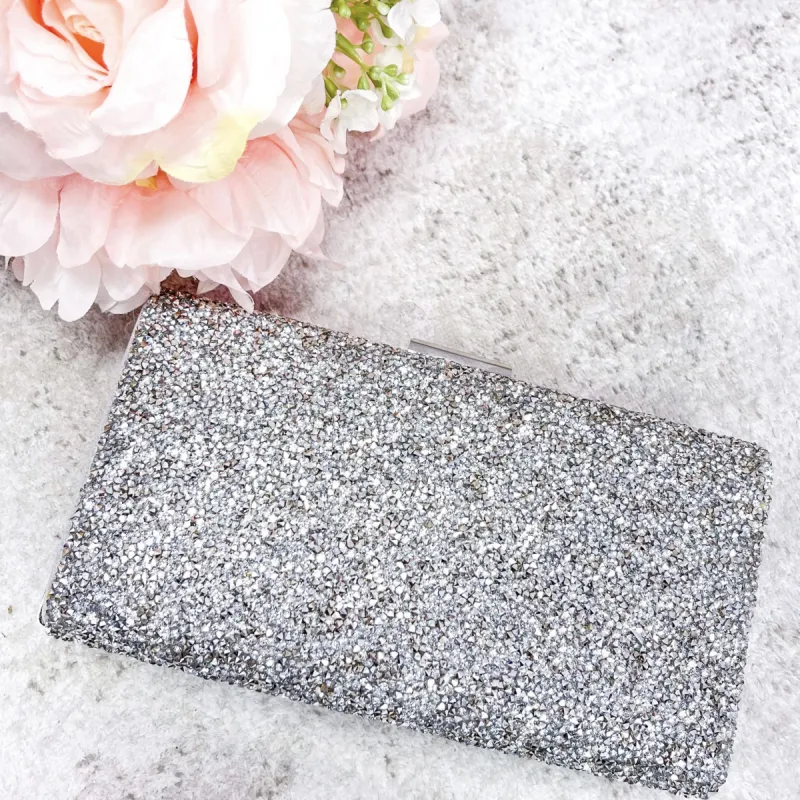 Black Tie Affair Clutch: Silver sold by Bella and Bloom