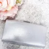 Black Tie Affair Clutch: Silver sold by Bella and Bloom