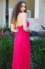 Misha Cutout Pleated Maxi Dress: Hot Pink sold by Bella and Bloom