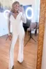 Jenna Embellished Lace Long Sleeve Jumpsuit: White sold by Bella and Bloom