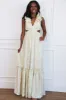 Floral Fantasy Ruffle Cutout Maxi Dress: Light Sage sold by Bella and Bloom