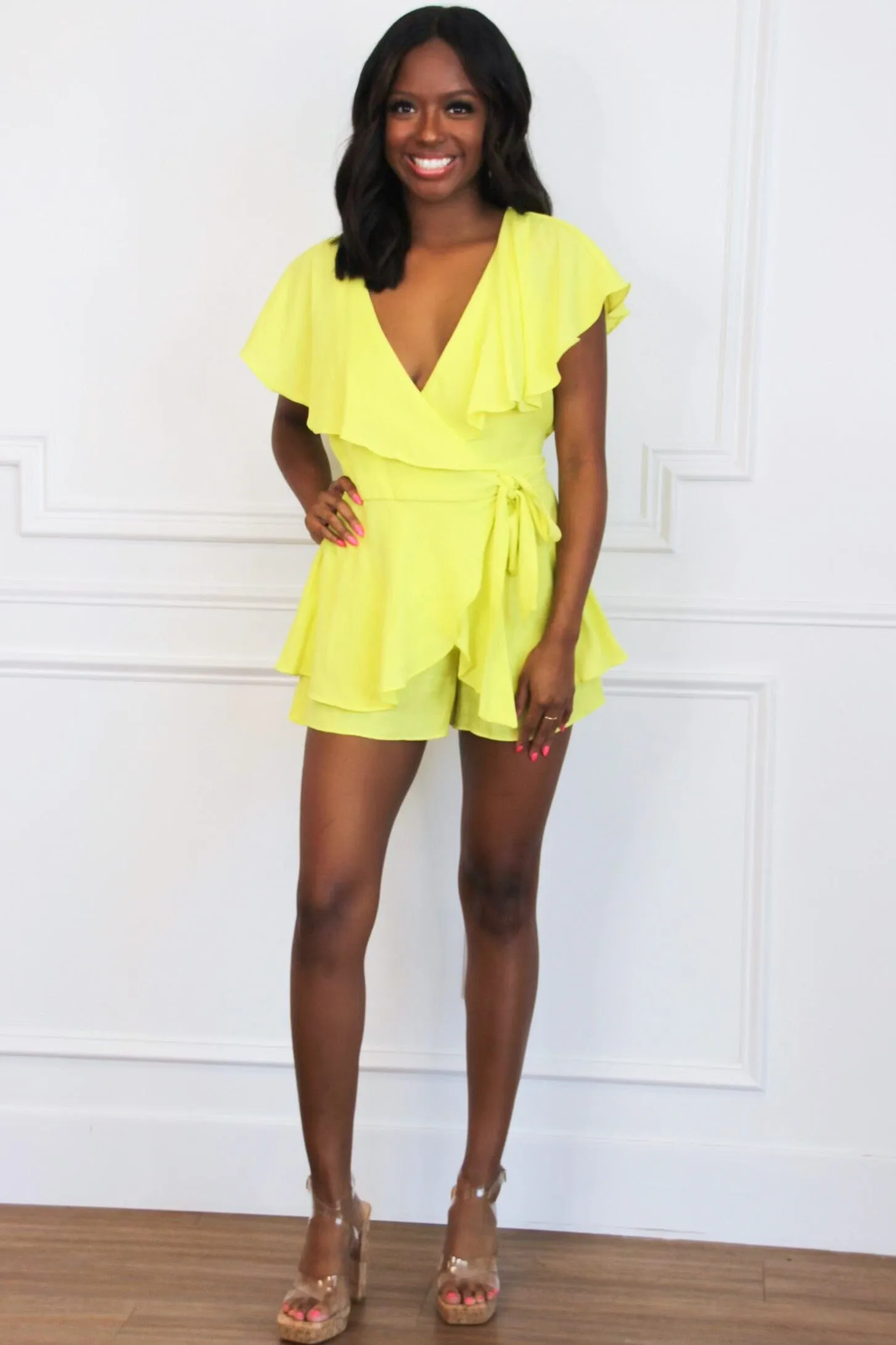 Feminine Frills Romper: Lemon sold by Bella and Bloom