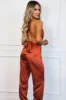Dream Come True Satin Jumpsuit: Rust sold by Bella and Bloom