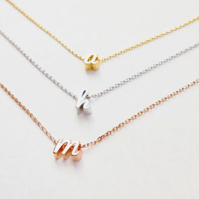 RESTOCK: Cursive Mini Initial Necklace sold by Bella and Bloom