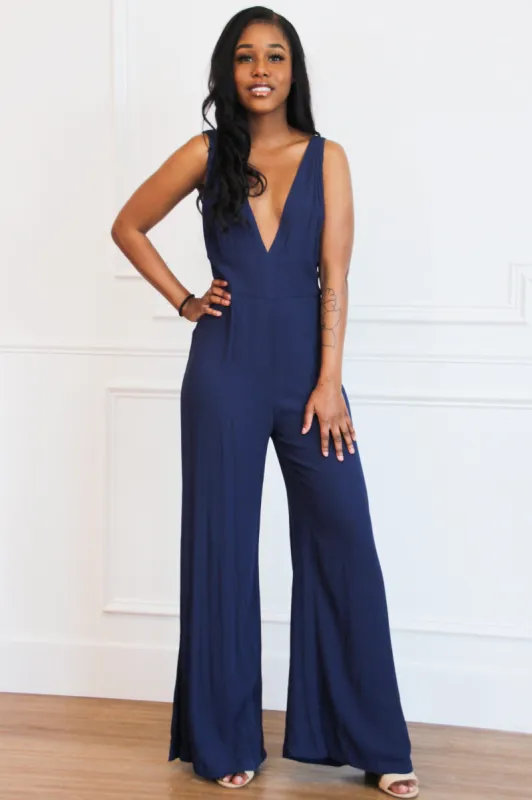 Keep Talking Jumpsuit: Navy sold by Bella and Bloom