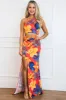Ava Cutout One Shoulder Maxi Dress: Orange/Blue FLORAL sold by Bella and Bloom