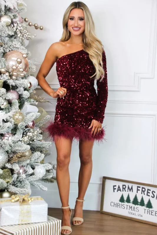 Don't Blame Me Sequin One Shoulder Feather Dress: Burgundy sold by Bella and Bloom