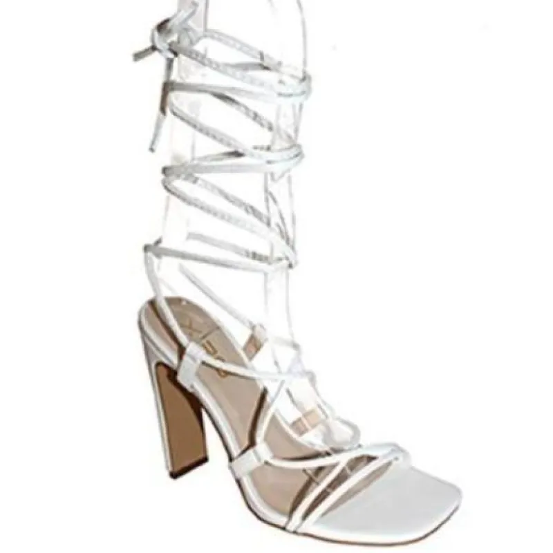 Take Me Downtown Lace Up Heels: White sold by Bella and Bloom