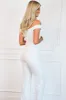 Love You Still Off Shoulder Sequin Jumpsuit: White sold by Bella and Bloom
