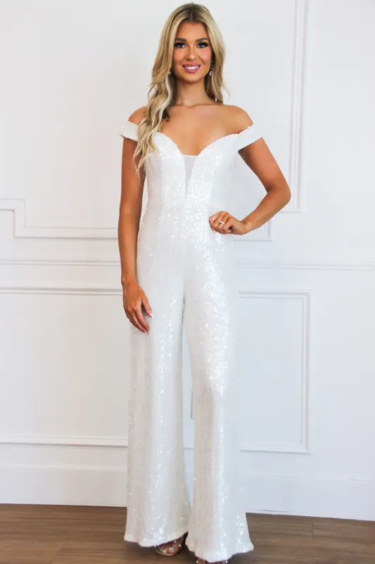 Good Luck Charm Sequin Off Shoulder Jumpsuit: White sold by Bella and Bloom