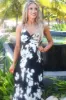 Pretty in Pleats Maxi Dress: Black/White sold by Bella and Bloom