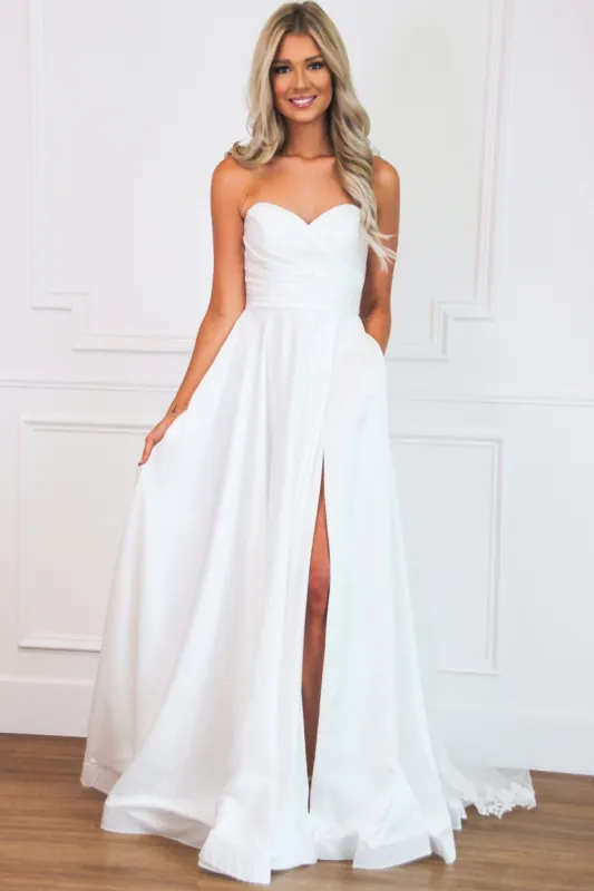Caught in a Fairytale Strapless Slit Wedding Dress: White sold by Bella and Bloom