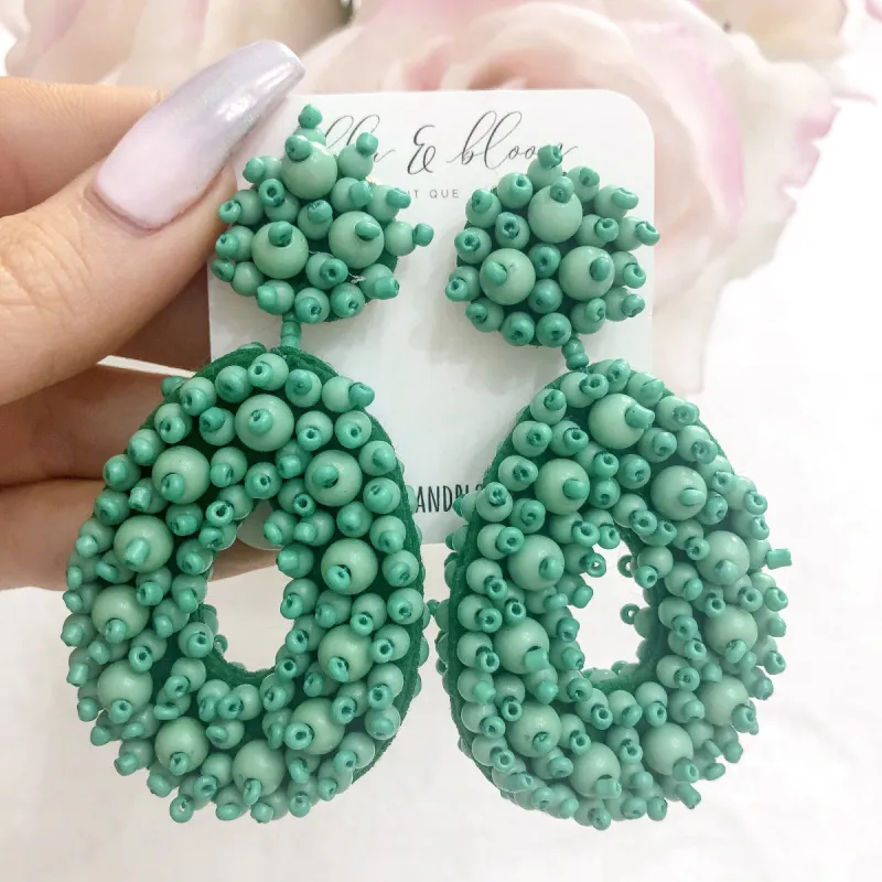 Beaded Teardrop Earrings: Green sold by Bella and Bloom
