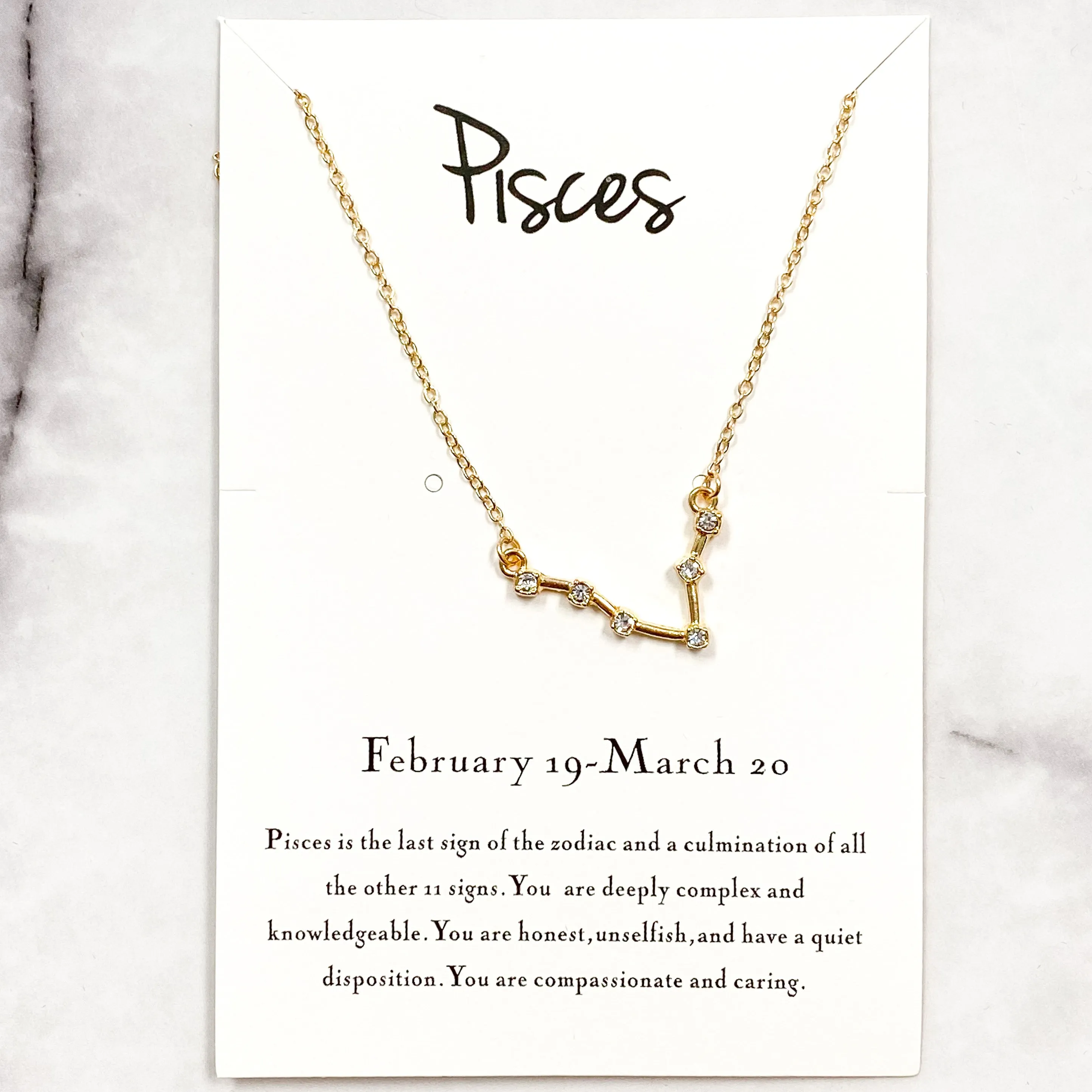 Zodiac Necklace: Gold, Pisces sold by Bella and Bloom