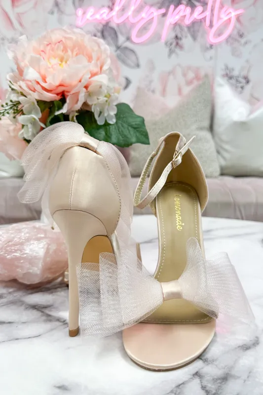 Bow So Cute Heels: Nude sold by Bella and Bloom