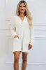 Amber Trails Chenille Sweater Romper: Cream sold by Bella and Bloom