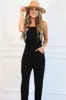 Jetsetter Jumpsuit: Black sold by Bella and Bloom