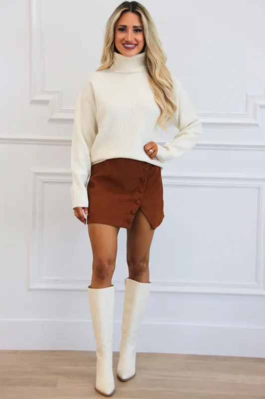 Charlie Turtleneck Sweater: Cream sold by Bella and Bloom
