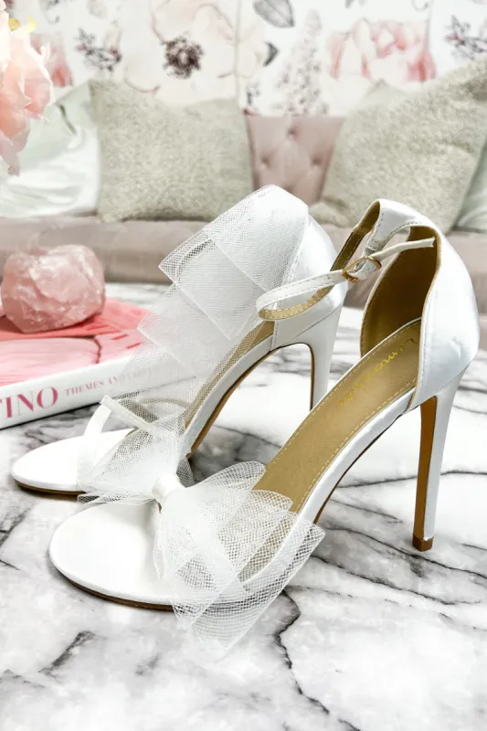 Bow So Cute Heels: White sold by Bella and Bloom