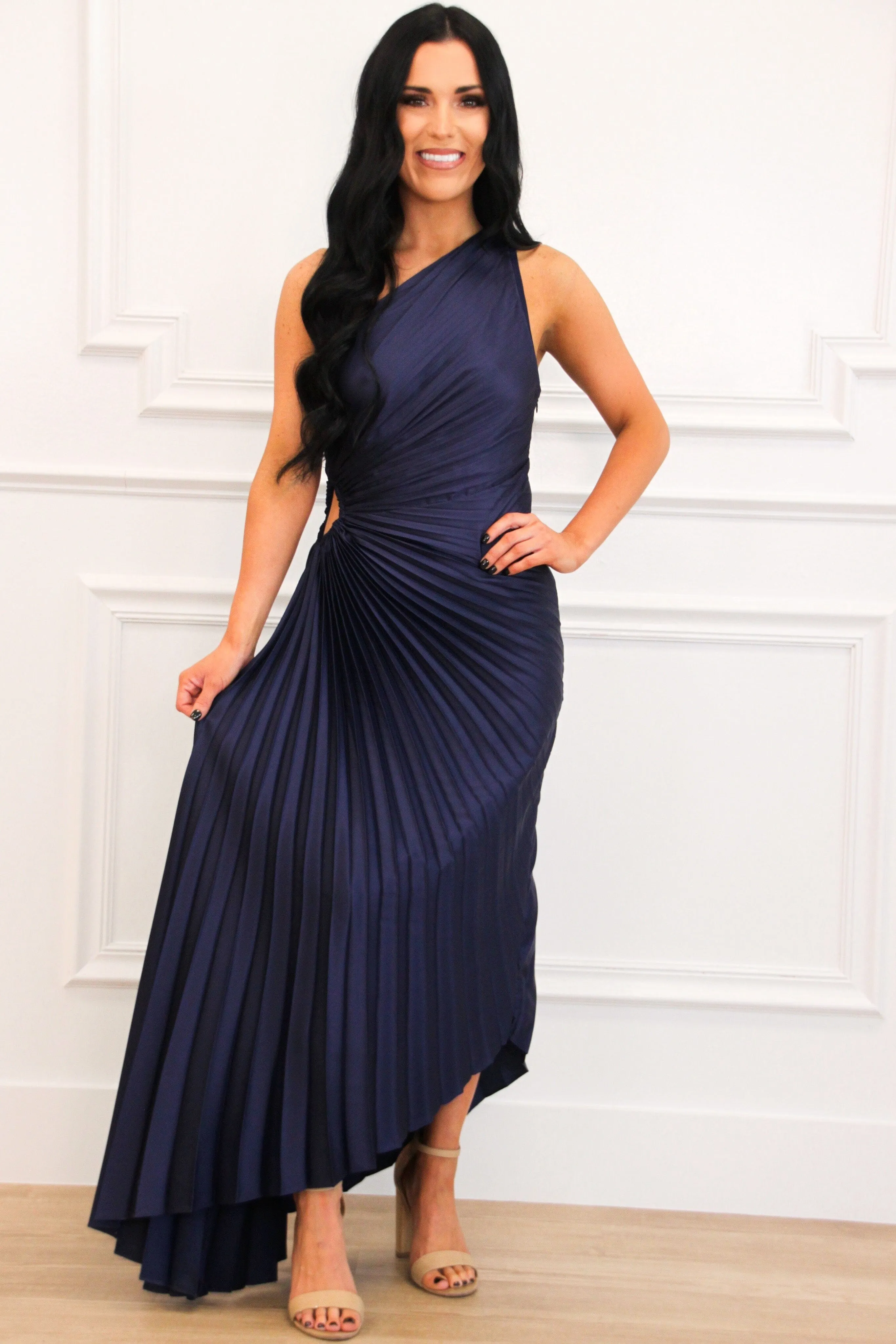 Novelle One Shoulder Pleated Asymmetrical Maxi Dress: Midnight Blue sold by Bella and Bloom