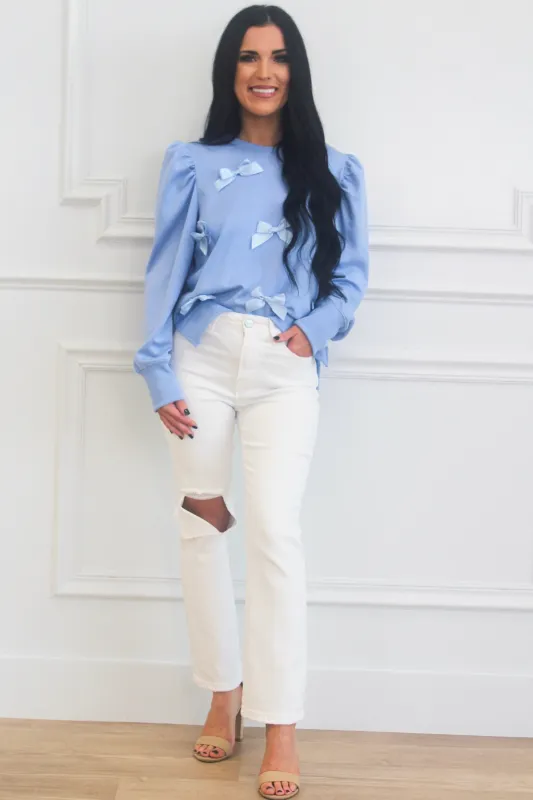 Elouise Bow Sweater: Blue sold by Bella and Bloom