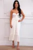 Happy Place Smocked Jumpsuit: White sold by Bella and Bloom