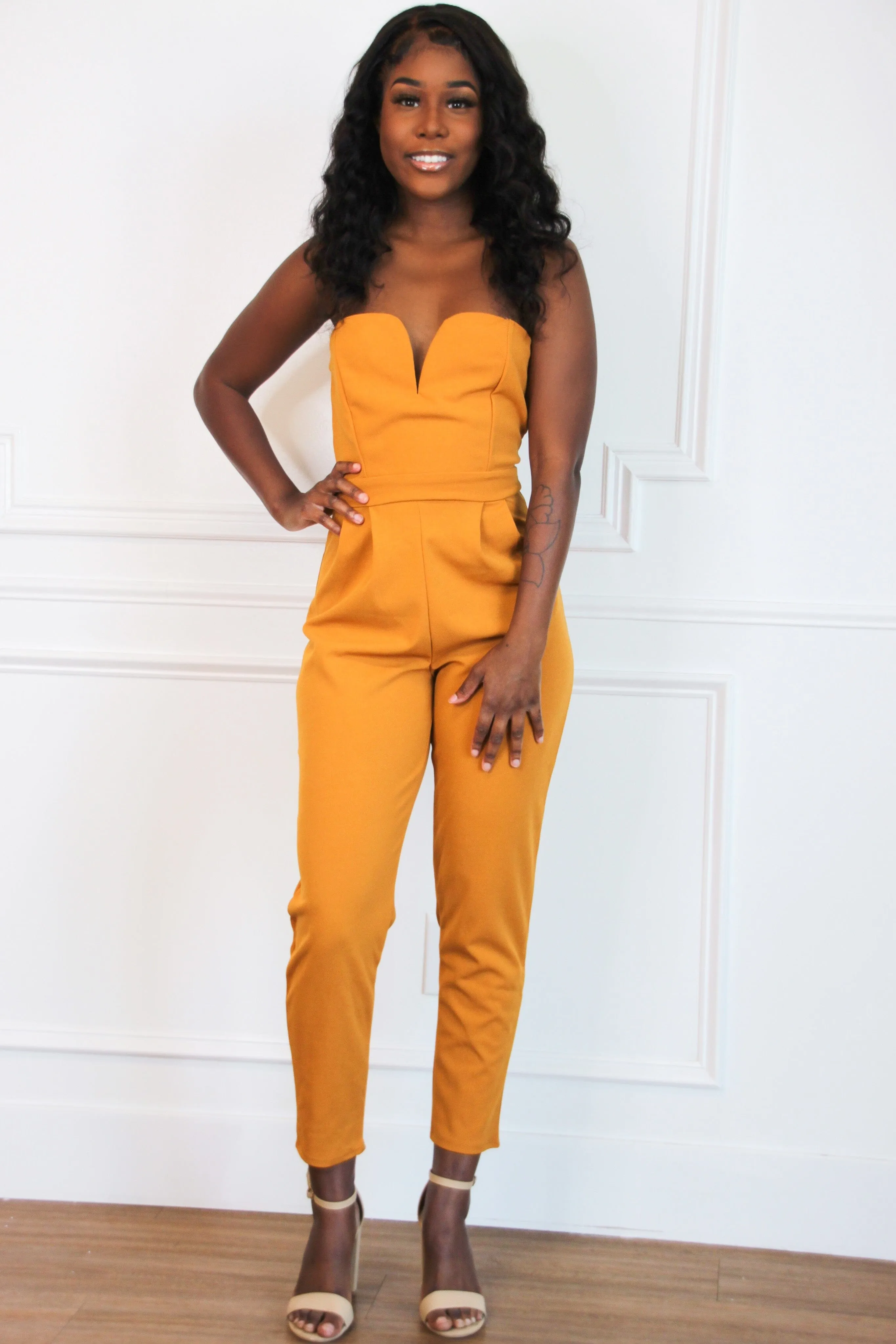 Back At It Jumpsuit: Mustard sold by Bella and Bloom