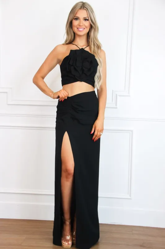 Wisteria Cutout Rosette Maxi Dress: Black sold by Bella and Bloom