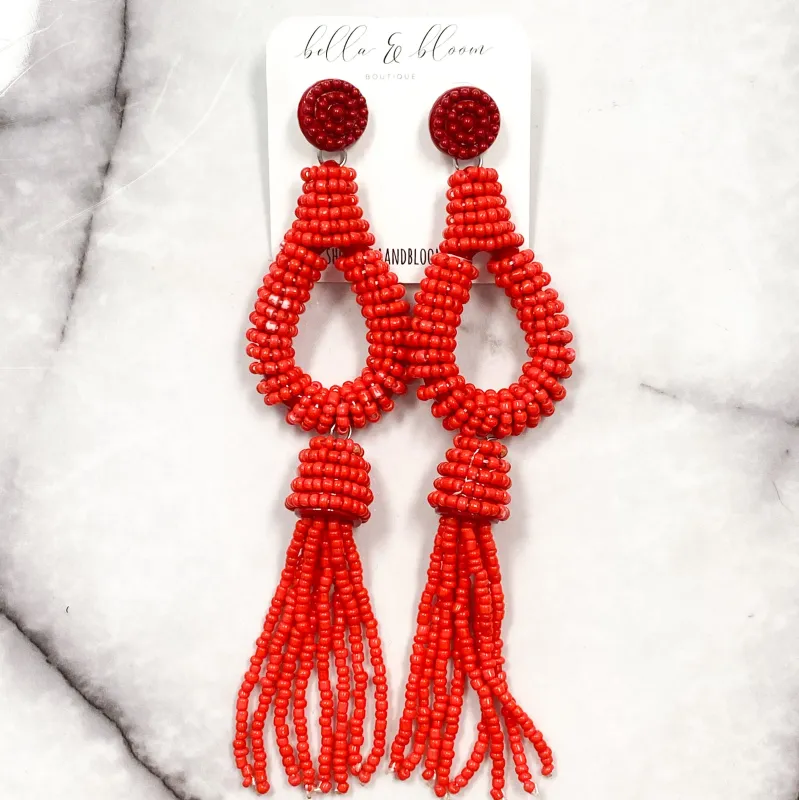 Beaded Teardrop Tassel Earrings: Red sold by Bella and Bloom