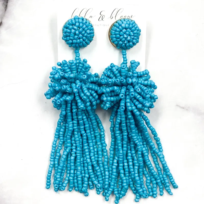 Beaded Burst Tassel Earrings: Turquoise sold by Bella and Bloom