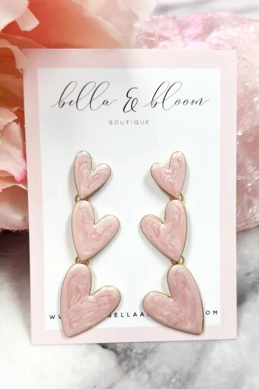 Love You More Tri-Heart Earrings: Light Pink sold by Bella and Bloom