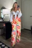 Fun in the Sun Pants: Rainbow Floral Multi sold by Bella and Bloom