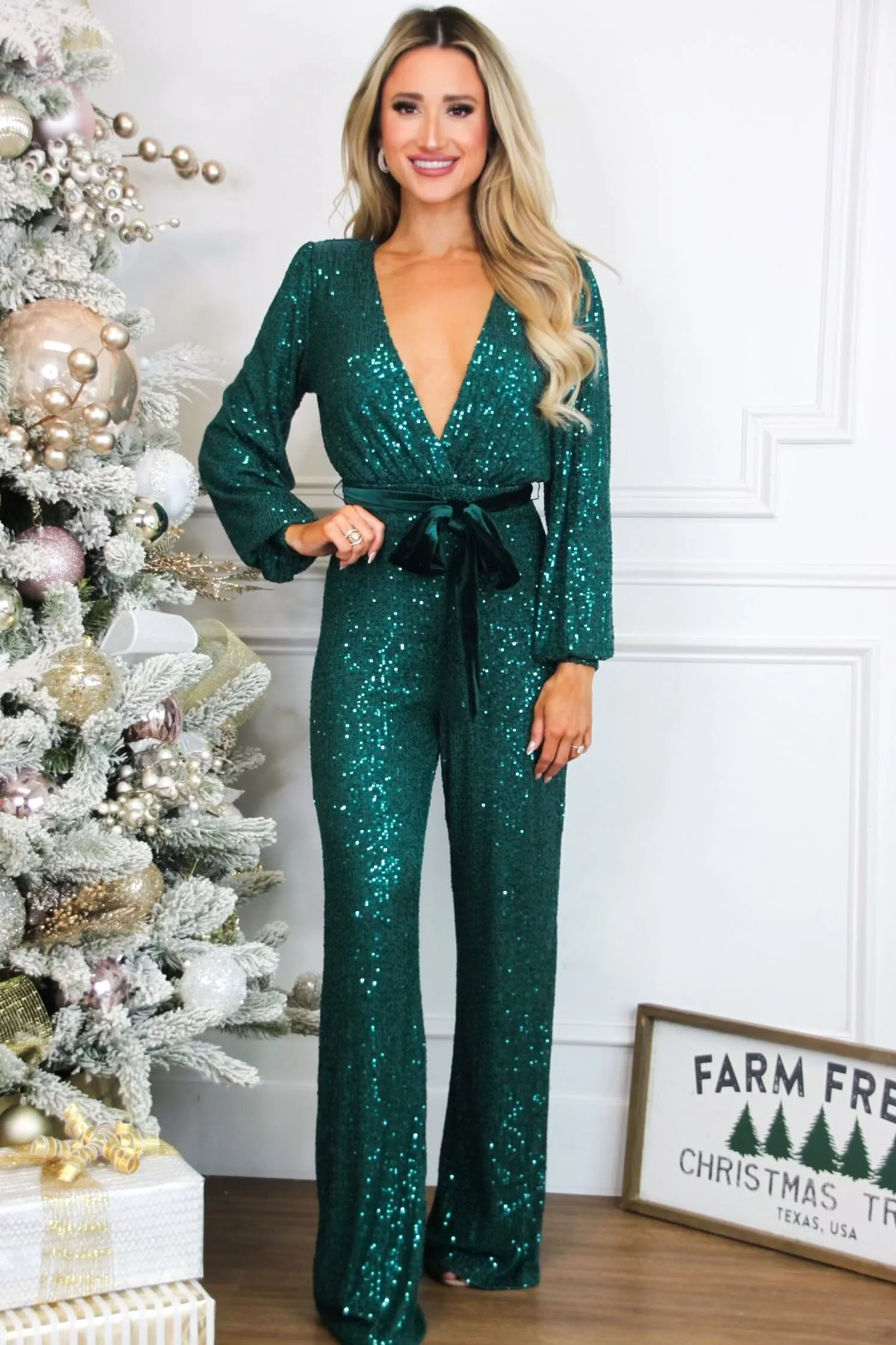 Walker Sequin Long Sleeve Jumpsuit: Emerald sold by Bella and Bloom