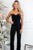 Put a Bow on It Velvet Jumpsuit: Black sold by Bella and Bloom