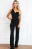 Emersyn One Shoulder Ruffle Jumpsuit: Black sold by Bella and Bloom