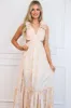 Floral Fantasy Ruffle Cutout Maxi Dress: Light Pink sold by Bella and Bloom