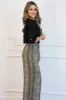 RESTOCK: Roll Tab Sleeve Top: Black sold by Bella and Bloom