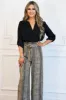 RESTOCK: Roll Tab Sleeve Top: Black sold by Bella and Bloom