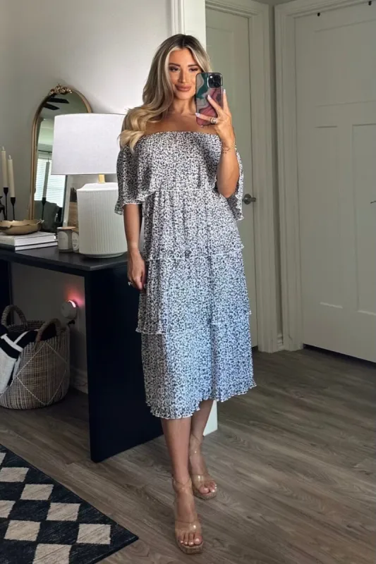 Seeing Spots Pleated Midi Dress: Black/White sold by Bella and Bloom