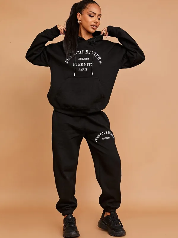 Cally Embroidered French Riviera Hooded Fleece Co-ord In Black made by Vivichi