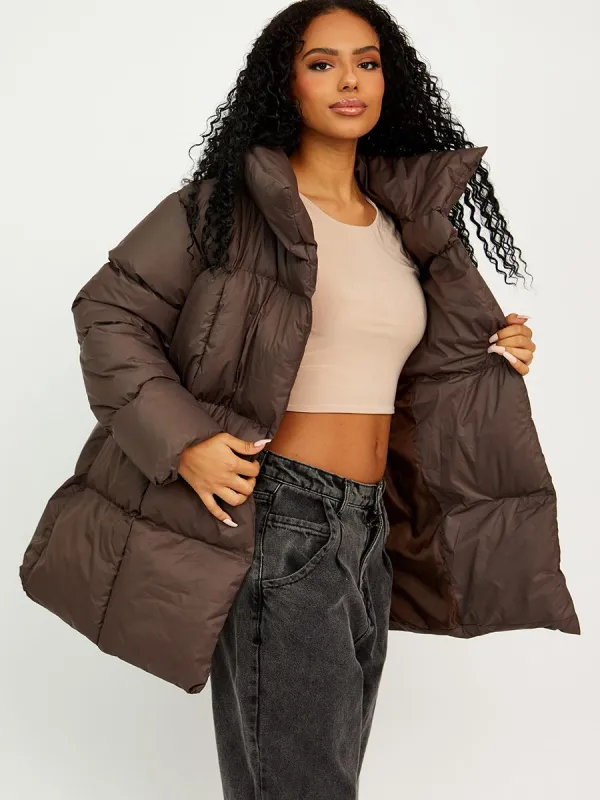 Ellie Oversized Padded Jacket With Belt In Brown made by Vivichi