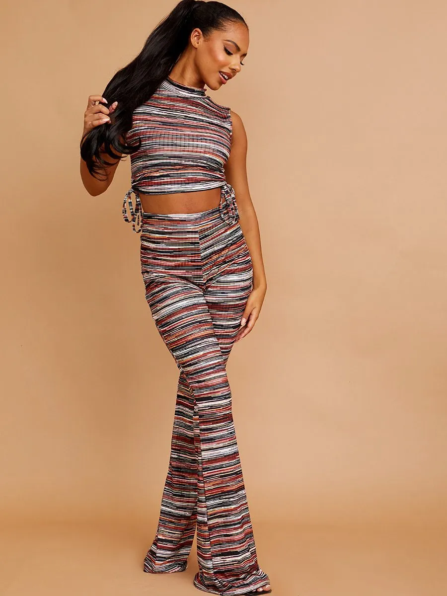 Holie Multi Coloured Ruched Crop Top & Flared Trouser Co-ord In Rust sold by Vivichi