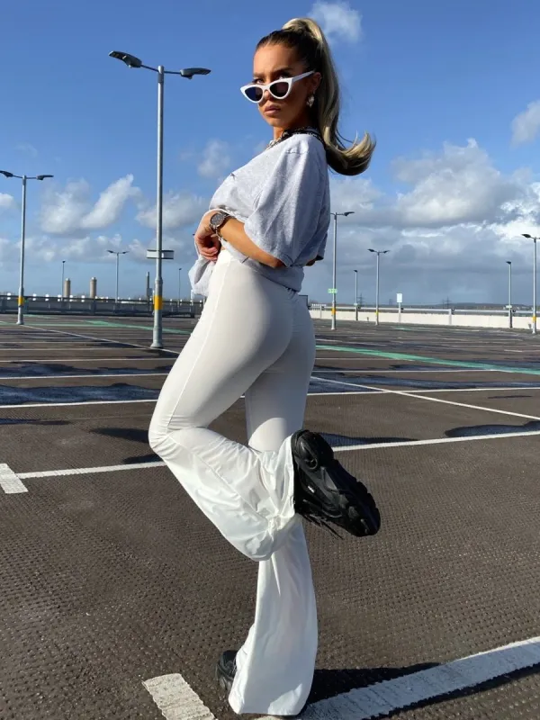 Stevie Scrunch Back Flared Slinky Trousers In Cream sold by Vivichi