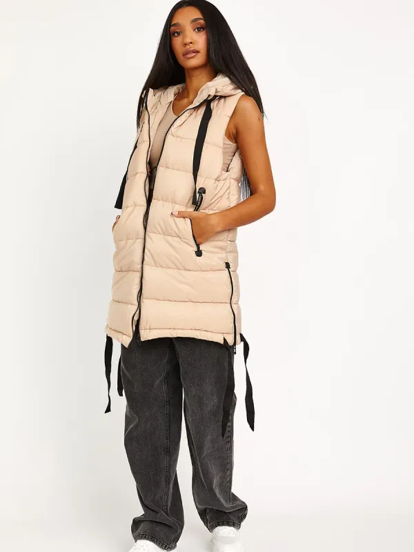 Estelle D-Ring Tape Padded Hooded Gilet In Stone sold by Vivichi