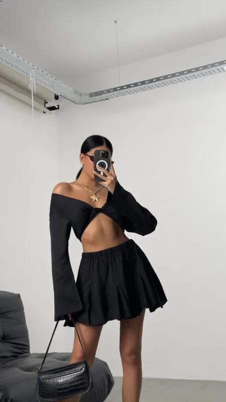 *PRE-ORDER* Mariam Flared Mini Skirt In Black sold by Vivichi