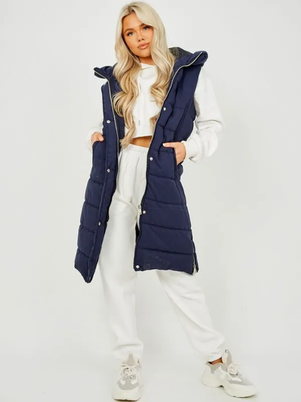 Michele Longline Hooded Puffer Gilet In Navy made by Vivichi