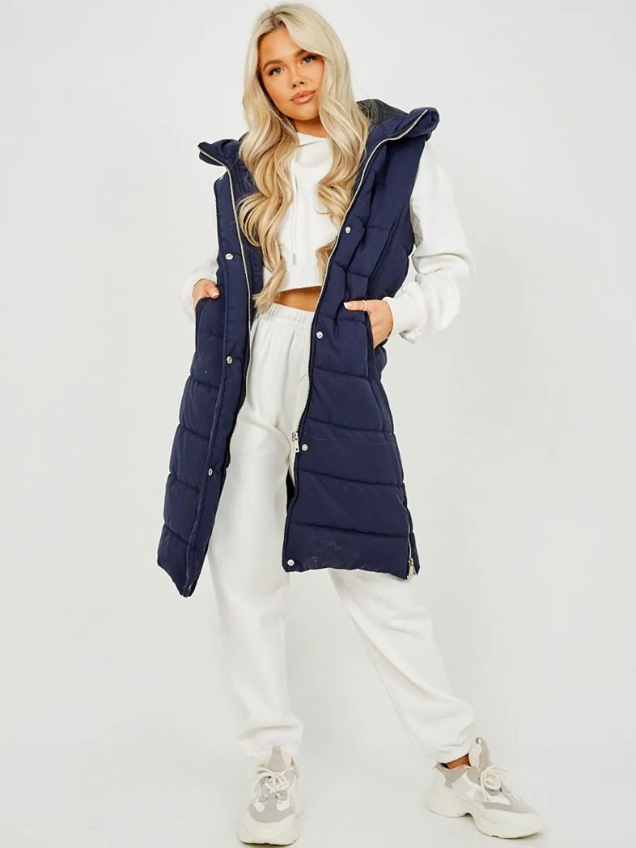 Michele Longline Hooded Puffer Gilet In Navy sold by Vivichi