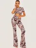 Shayla Marble Print Ribbed Flared Trousers In Stone sold by Vivichi
